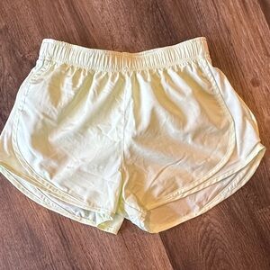 Nike Women's Light Yellow Athletic Shorts